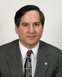 Passport [portrait sitting for] John Trasvina, Assistant Secretary for Fair  Housing and Equal Opportunity