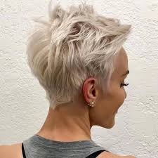 The ash blonde cut is parted on the side and combed smooth on the top, so there are no flyaways. Messy Short Pixie Haircut Very Short Hair Styles For Female Short Hair Styles Pixie Blonde Pixie Haircut Messy Pixie Haircut