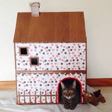 Penny For A Song Cardboard Cat House Cardboard Cat House Cat House Diy Cat Playground Outdoor