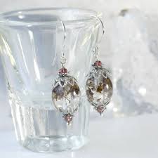 Most people know that dried pressed flowers make awesome additions to greeting cards and invitations, but that's just the tip of the iceberg. Mauve Pink Real Pressed Flowers In Resin Drop Earrings Iris Elm Jewelry Shop For Unique Bohemian Earrings Bracelets Necklaces And Artisan Handmade Soap