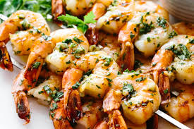 Placed shrimp on foil on hot bbq grill to heat. Garlic Grilled Shrimp Skewers Downshiftology