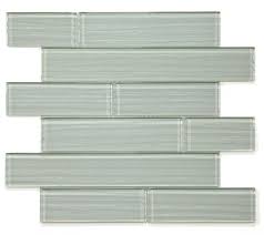 Simple yet beautiful, this bathroom features a striking vanity wall using subway tiles of two different sizes. Casale Silver Grey Textured Glass In Subway Layout Mosaic Tile Kitchen Bathroom Wall Shower Accent Wall Backsplash