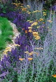 Perennial Border With Salvia Common Yarrow And Russian Sage Plants Butterfly Garden Design Beautiful Gardens