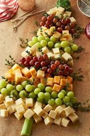 Christmas tree cheese bread is a warm, garlicky side dish you'll love to gift and enjoy. Christmas Tree Cheese Board Christmas Food Food Holiday Recipes