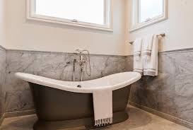 You should see black cast iron or bright steel. Black Cast Iron Bathtub In Nook Transitional Bathroom