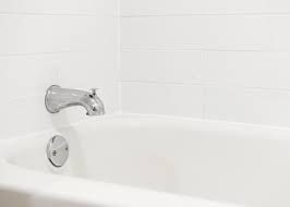 You might find it more cost effective to hire a tile contractor, or general contractor company to perform the work. To Replace Or Reglaze The Story Of The Garden S Bathtub Yellow Brick Home
