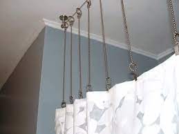 This shower curtain rod is available in a variety of finishes, allowing you to choose a color that matches the other fixtures in your bathroom. High Wire Act Diy Shower Curtain Rod Diy Shower Curtain Unique Shower Curtain Shower Curtain Rods