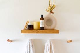 For easy access to your stuff, use a wooden ladder. 17 Small Bathroom Shelf Ideas