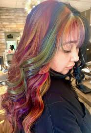 Who is a queer hairstylist near Selden for edgier hairstyles?