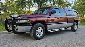 Image result for Medium Red 2000 Dodge