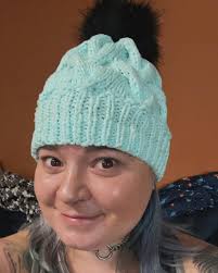 No one understands my excitement but I made this hat… AND IT GLOWS Props to  my husband (Casey Hanna) for helping me sew it up and put the pom pom on