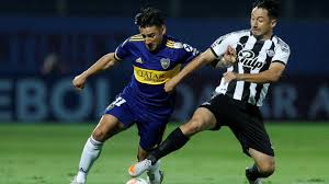 Boca jugó con firmeza en Paraguay y derrotó a Libertad con un doblete de  Salvio