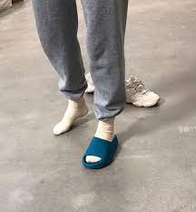 It was a small collection—about 30 pieces total in just 18 looks, plus one west's strongest footwear relationship is obviously with his sneakers, but he actually has a long (and even tumultuous) history with slides. Kanye West Yeezy Slides Yahoosports