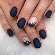 Navy blue designs are just simple, but adding golden lines to them and designing the ring and thumb fingers in the opposite way (golden base with navy lines) gives the design a new taste. Elegant Navy Blue Nail Colors And Designs For A Super Elegant Look