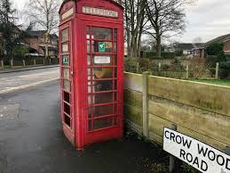 Books and bookshelves in a famous red british telephone box. New Lease Of Life For Slag Lane Phone Box Lowton And Golborne News