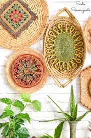 For example, the frame of this unique wall hanging is a tree branch that can be found in your own backyard. Basket Wall Decor With Bohemian Design From The Thrift Store