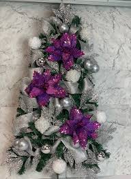 This curtain features an elegant white christmas tree with purple and lavender themed decorations. Take The Hassle Out Of Office Christmas Decor We Do It All For You
