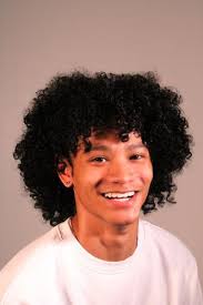 Breaking Beauty Norms: Natural Curls Take Center Stage