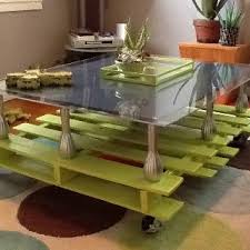 48w x 33.5d x 19t. Pallet Coffee Table With Plexiglass And Wooden Top Elevated With Painted Vases C Heubach Coffee Table Pallet Coffee Table Decor