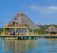Over Water Bungalow with Thatch Roof Caribbean Sea Stock ...