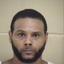 Two charged with carrying weapons in school zone