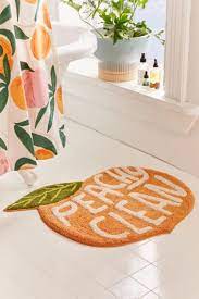 But whether you're a bath person or a shower person, you probably spend a lot of time in there — why not add a little flair? Peachy Clean Bath Mat Urban Outfitters
