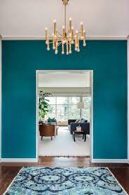 This tone is compatible with both greige and teal, so there is nothing to worry. Galapagos Turquoise Walls And Ikat Rug Turquoise Room Teal And Copper Bedroom Turquoise Walls