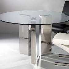 Wonderful round table having a heavy gilt metal base with a curlicue decorative design and thick round glass on top. 18 Sleek Glass Dining Tables Glass Round Dining Table Glass Dining Table Round Dining Table