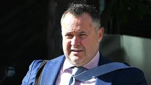 Lawyer Adam Magill in court for allegedly breaching bail