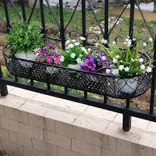 Holders for wrought iron railings. Space Saving Balcony Planters Clever Ideas For Small Balcony Gardens