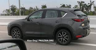 License plate frames, gift sets/mazda/slimline/zoom zoom mazda keychains, mazda/mazdaspeed/zoom zoom mazda valve stem caps retractable cargo cover roadside assistance kit soft cargo liner w/ rear bumper flap windshield sunscreen (folding type). New Mazda Cx 5 Spotted In Malaysia Ahead Of Launch Paultan Org
