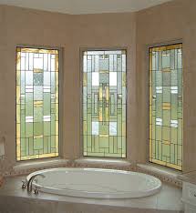Our stained glass bathroom window designs most often incorporate design elements that provide privacy to the bathroom occupant while also providing an aesthetically pleasing, stained glass, art work piece to the room. Houston Bathrooms Scottish Stained Glass Custom Studio