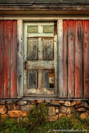 A set of old red barn doors with large white x across doors. Pin On Windows Doors Boards