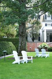 Front Lawn With Adirondack Chairs The Woodstock Inn Backyard Landscaping Outdoor Gardens Backyard