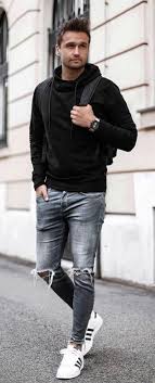 Black And Blue Outfits Fall Outfit Inspiration With A Black Hoody Black Canvas Backpack Ripped Blue Jeans Watch White Adidas Sneak Mens Outfits Sneakers Men Fashion Mens Street Style