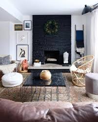 The black fireplace is gorgeous!!! How To Paint A Stone Fireplace Black The Y Guide