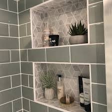 Take advantage of the space above the sink by installing a recessed medicine cabinet! Recessed Bathroom Shelves Built In Shower Shelf Shower Shelves Bathroom Decor