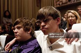 Kelby Johnson and Alex Libby listen during a panel discussion after a...  News Photo