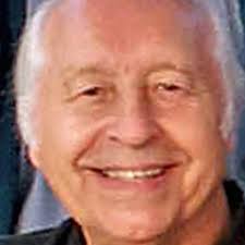 For a sandy beech you can't beat Lee Beach at Pefki just south of Lindos