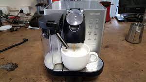 This may be speculating too much, but perhaps the subtle positioning as the default model on the. Delonghi En720m Nespresso Coffee Machine Youtube