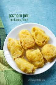 Pazham Pori Recipe Popular Snack From Kerala Made With Ripe Bananas Banana Slices Are Coated In An All Purpose Banana Fritters Indian Snack Recipes Fritters