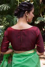They look good with almost all body types and complexions. Maroon Raw Silk Boatneck Blouse With Gold Sequin Border House Of Blouse