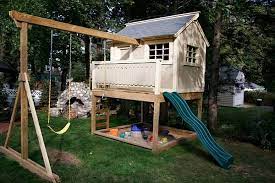 We offer playsets and swing sets with covered clubhouses and lookout platforms, and fun features like wavy slides, tire swings, and ladders. Backyard Playhouse Pic Backyard For Kids Swing Set Playhouse Backyard Playhouse