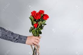 Maybe you would like to learn more about one of these? Man Holds Flowers Bouquet In The Man Hand Flower Congratulations For Women Male Hand With Red Roses Closeup Hand With Flowers Man With Flowers Hand Holdihg Givind Roses Stock Photo Picture And Royalty Free Image Image