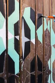 Update Your Fence With A Colorful Mural Fence Paint Colorful Murals Mural