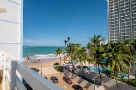 There's a sun deck that features an outdoor jacuzzi, a fully equipped business center, and a fitness facility. Sandy Beach Hotel San Juan Puerto Rico San Juan Hotel Discounts Hotels Com