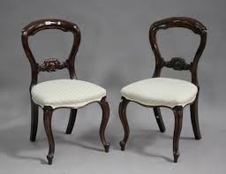 2 victorian balloon back side chairs with lime green velvet fabric and carved wood frames with castered feet. A Set Of Eight Modern Victorian Style Stained Hardwood Spoon Back Dining Chairs With Upholstered Sea