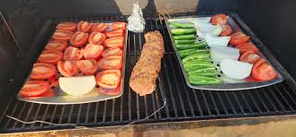 What's one everyone's smoker today? 1st up for me: smoked salsa and deer  back strap 2nd will be: smoked candied bacon (maple, brown sugar, burbon)  3rd will be: smoked cream cheese This