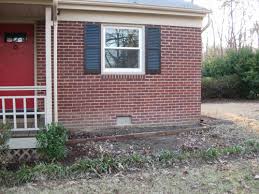 The only one i've found so far is that placing smaller trees at corners of the house can make it seem taller in relation to its. Redoing Our Ranch S Front Landscaping Young House Love