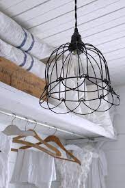 Wire Basket Ceiling Fixture In Farmhouse Laundry Room Farmhouse Light Fixtures Diy Light Fixtures Laundry Decor